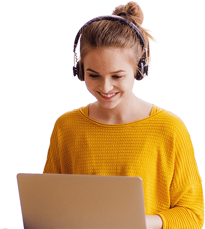 Person wearing headphones using a laptop